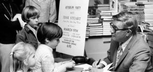 Jesse Stuart as an older man with young readers. Photo credit: Jesse Stuart Foundation Pinterest page.